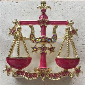 Anthropologie Gold and Pink Zodiac Brooch